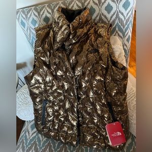 The North Face Large Women’s black gold puffer vest